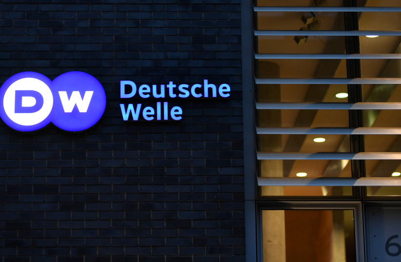 The logo of German international broadcaster Deutsche Welle is pictured in Berlin (photo credit: REUTERS)