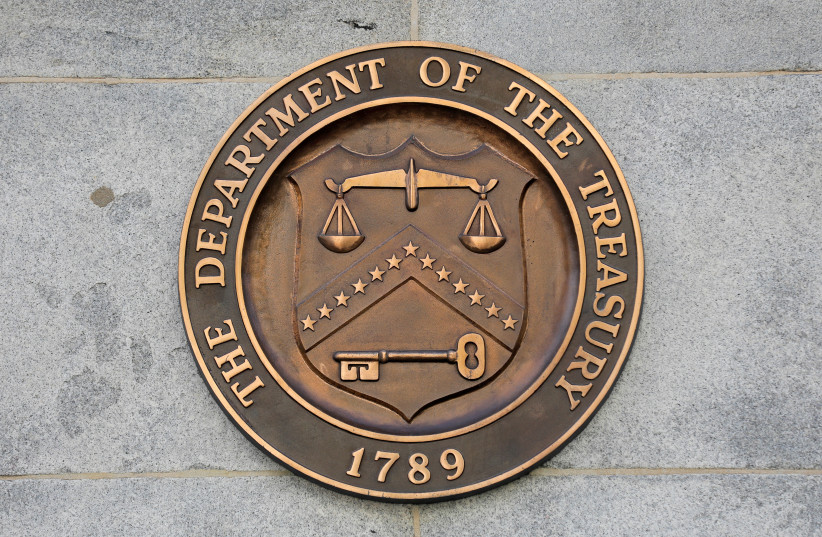  Signage is seen at the United States Department of the Treasury headquarters in Washington, DC (photo credit: REUTERS/ANDREW KELLY)
