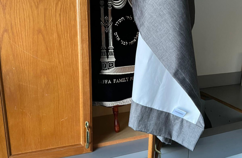  The Torah scroll was left untouched when a Kansas City Chabad was ransacked by criminals over Hanukkah. (credit: Rabbi Yitzchak Itkin)