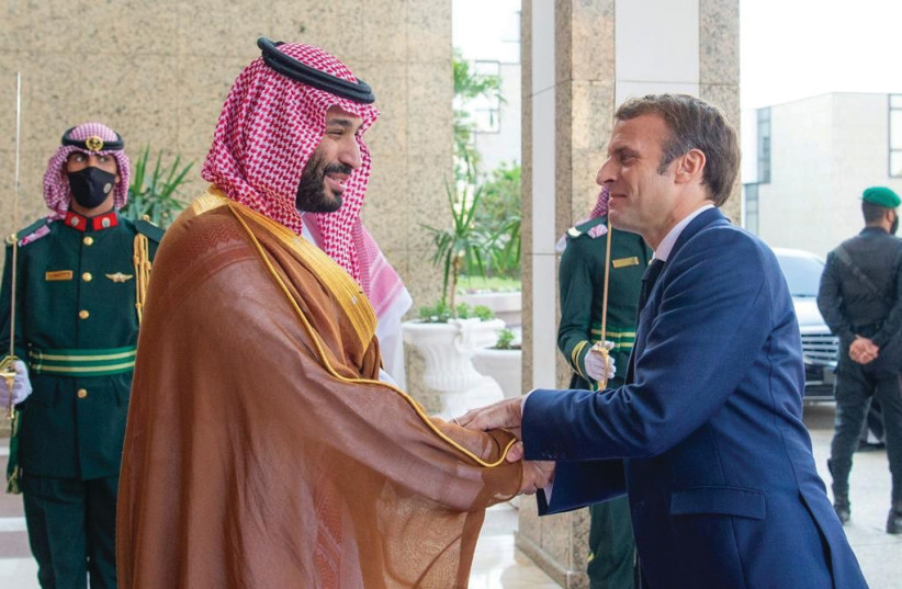  SAUDI CROWN Prince Mohammed bin Salman receives French President Emmanuel Macron in Jeddah last Saturday. (photo credit: Saudi Royal Court/Reuters)