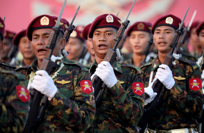 Soldiers take part in a military parade to mark the 74th Armed Forces Day in the capital Naypyitaw, Myanmar, March 27, 2019. (credit: REUTERS/ANN WANG/FILE PHOTO)