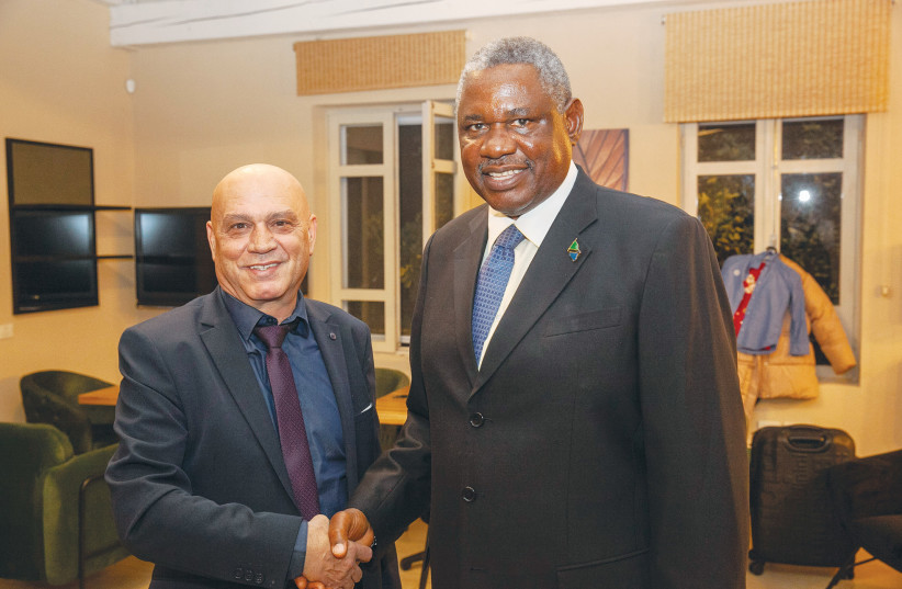  Regional Cooperation Minister Esawi Frej with Job Daudi Masima, the ambassador of Tanzania. (credit: Gidi Avineri)