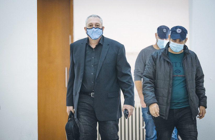  NIR HEFETZ arrives at the Jerusalem District Court this week. (photo credit: YONATAN SINDEL/FLASH90)