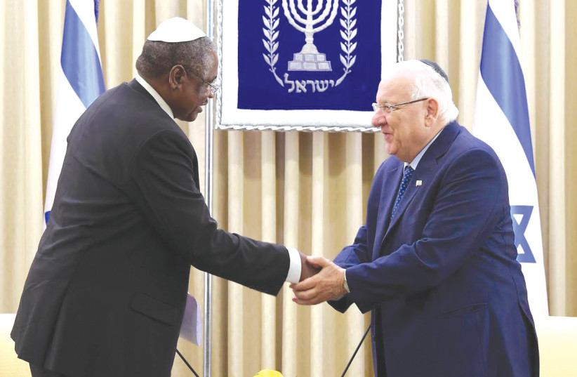  OUTGOING TANZANIAN Ambassador to Israel Job Daudi Masima presents his credentials to then-president Reuven Rivlin upon his arrival in Israel in 2017. (photo credit: MARK NEYMAN/GPO)