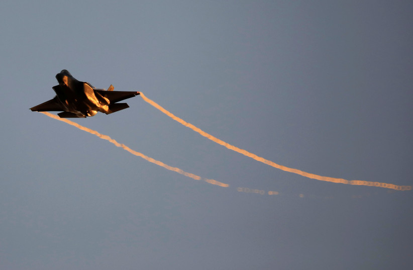 An Israeli Air Force F-35 flies during an aerial demonstration at a graduation ceremony for Israeli air force pilots at the Hatzerim air base in southern Israel, June 27, 2019. (photo credit: REUTERS/AMIR COHEN)