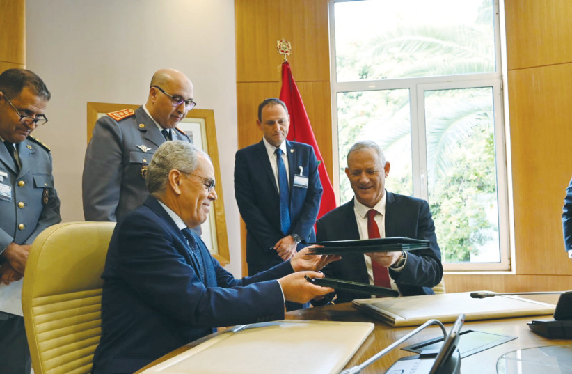  DEFENSE MINISTER Benny Gantz and Morocco’s Defense Administration Minister Abdellatif Loudiyi sign a defense memorandum in Rabat last month. (photo credit: ISRAEL DEFENSE MINISTRY)