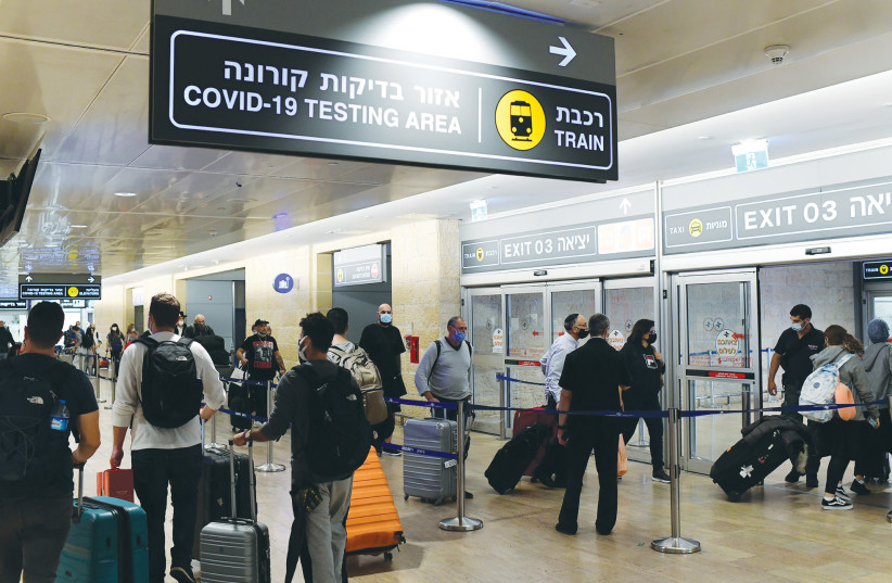 A SIGN at Ben-Gurion Airport directs passengers to the COVID-19 testing area. (credit: TOMER NEUBERG/FLASH90)