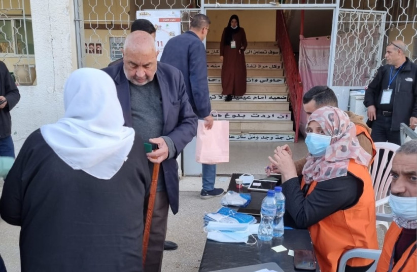  Palestinians voting in local elections in northern West Bank town of Burqin, December 11, 2021 (photo credit: KHALED ABU TOAMEH)