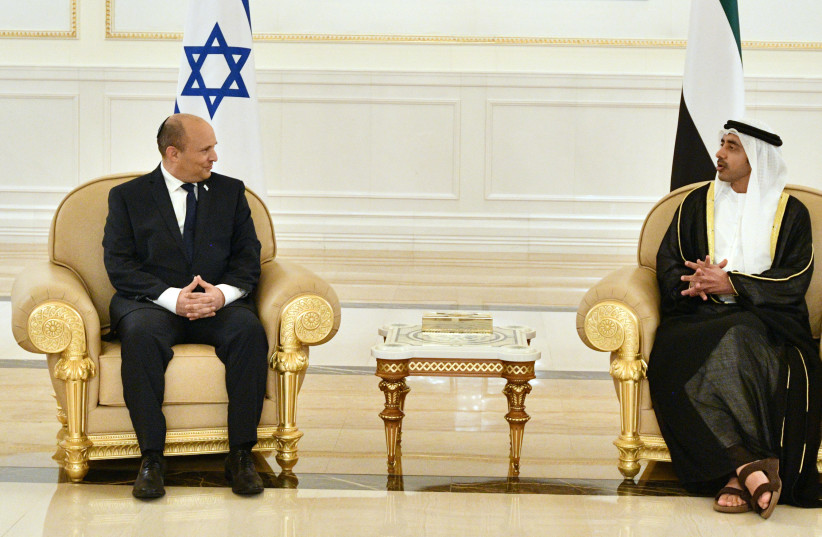  Prime Minister Naftali Bennett meets with UAE Foreign Minister Sheikh Abdullah bin Zayed in Abu Dhabi, December 12, 2021. (photo credit: CHAIM TZACH/GPO)