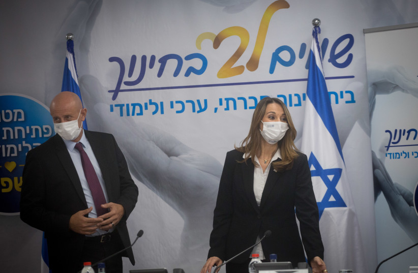  Education Minister Yifat Shasha-Biton and Education Minister director-general Yigal Slovik arrive to a press conference on August 31, 2021 (photo credit: MIRIAM ALSTER/FLASH90)