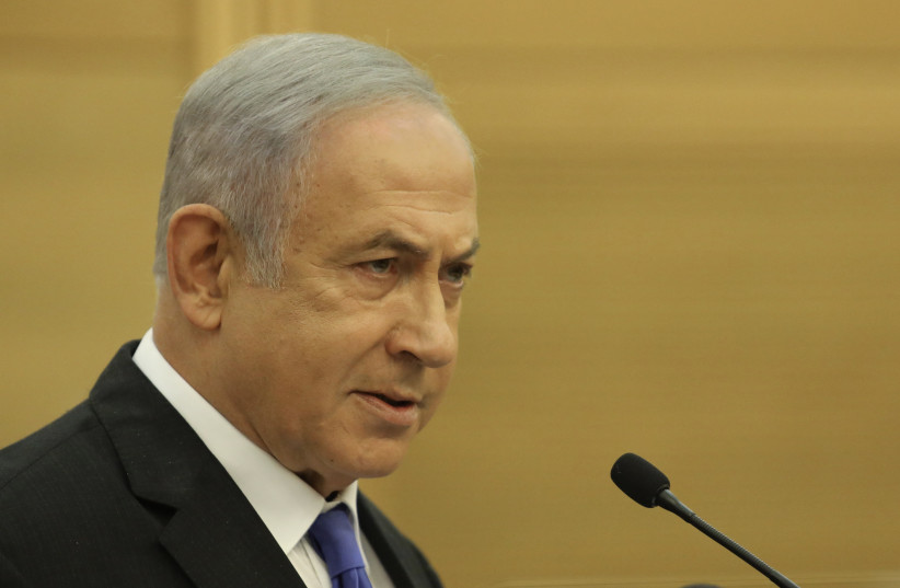  Likud head Benjamin Netanyahu at his party faction meeting, December 13, 2021. (credit: MARC ISRAEL SELLEM/THE JERUSALEM POST)