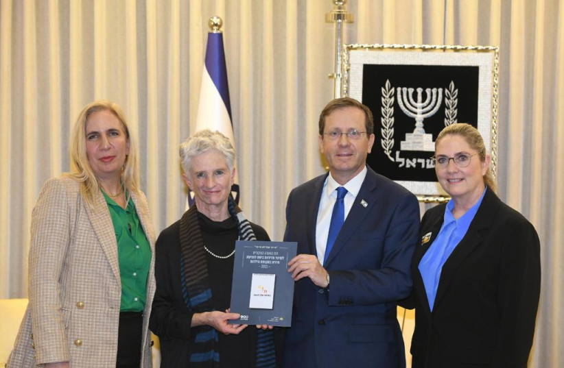  President Isaac Herzog at the reception of the report of the Israeli Independent Public Inquiry into Child Sexual Abuse, December 13, 2021. (credit: AMOS BEN GERSHOM/GPO)