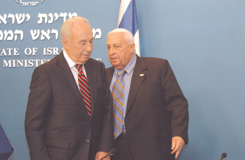  SHIMON PERES and Ariel Sharon in the Prime Minister's Office. The Iranian nuclear issue was, even then, on the agenda of every diplomatic meeting. (photo credit: FLASH90)