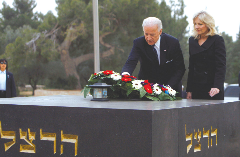  THEN-US VICE PRESIDENT Joe Biden and his wife, Dr. Jill Biden, lay a wreath at the grave of Theodor Herzl in Jerusalem in 2010. (photo credit: RONEN ZVULUN/REUTERS)