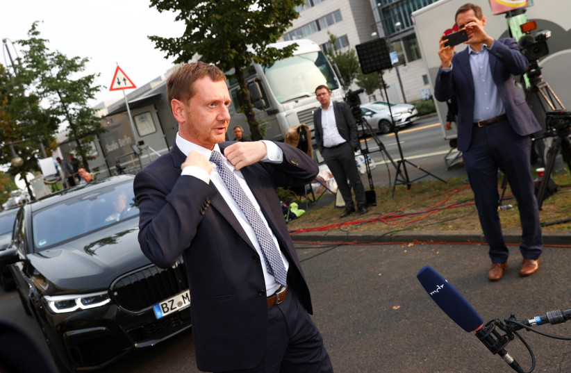 Saxony State Premier Michael Kretschmer of the Christian Democratic Union (CDU) arrives for their party leadership meeting, one day after the German general elections, in Berlin, Germany, September 27, 2021. (credit: REUTERS/KAI PFAFFENBACH)