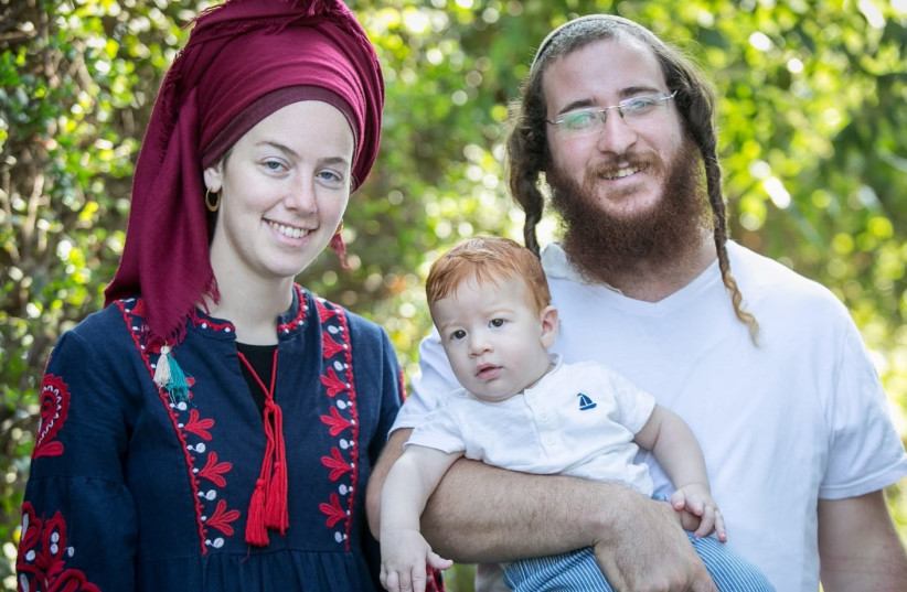  Yehuda Dimentman, killed by Palestinian terrorists at Homesh, is seen with his wife and child. (credit: Courtesy the Dimentman family)