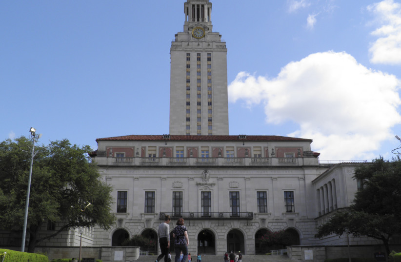 People walk at the University of Texas campus in Austin, Texas, US on June 23, 2016. (credit: REUTERS/JON HERSKOVITZ/FILE PHOTO)