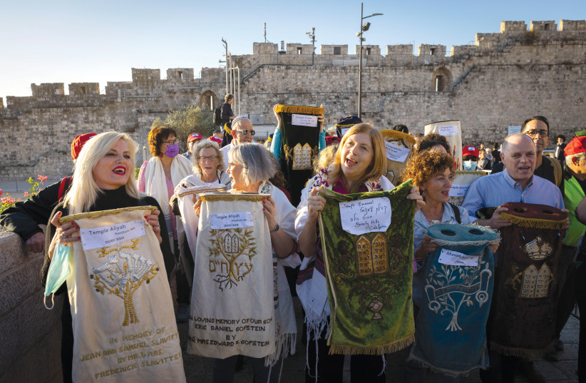 An egalitarian prayer service is led by the Women of the Wall near the Western Wall last month. (credit: OLIVIER FITOUSSI/FLASH90)