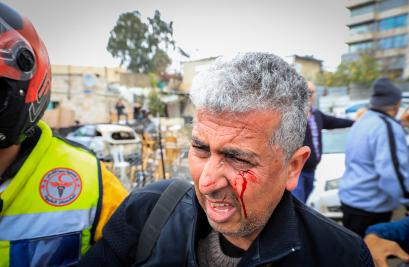  AP photographer Mahmoud Illean seen after being attacked by Israeli border police while covering a protest against the expulsion of Palestinian families from their homes in the East Jerusalem neighborhood Sheikh Jarrah.  (photo credit: JAMAL AWAD/FLASH90)