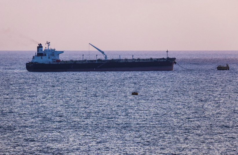 An oil tanker docks in the Mediterranean Sea near the oil port of Europe Asia Pipeline Company (EAPC), as seen from Ashkelon, Israel, June 10, 2021. (credit: REUTERS/AMIR COHEN)
