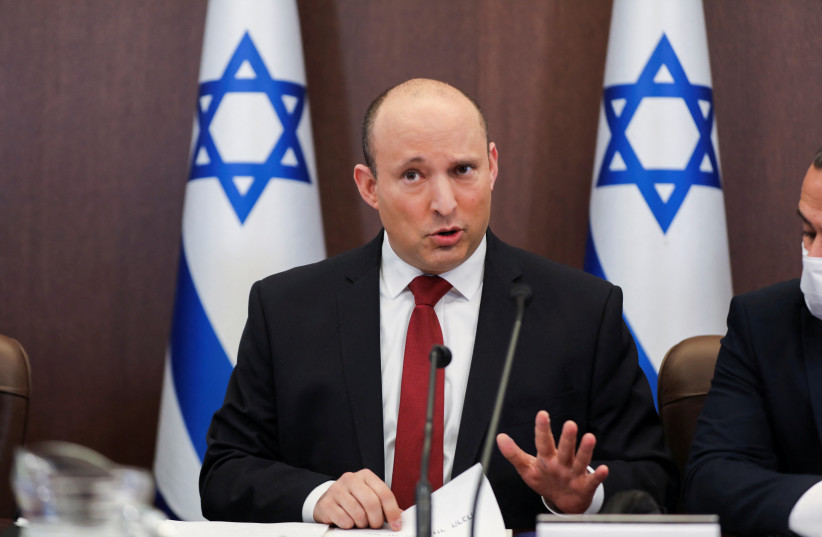  Israeli Prime Minister Naftali Bennett speaks as he attends a cabinet meeting at the Prime Minister's office in Jerusalem, Israel (photo credit: REUTERS)