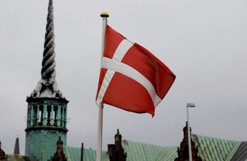  Denmark's national flag flutters in Copenhagen, Denmark, October 22, 2019 (photo credit: REUTERS/ANDREAS MORTENSEN)