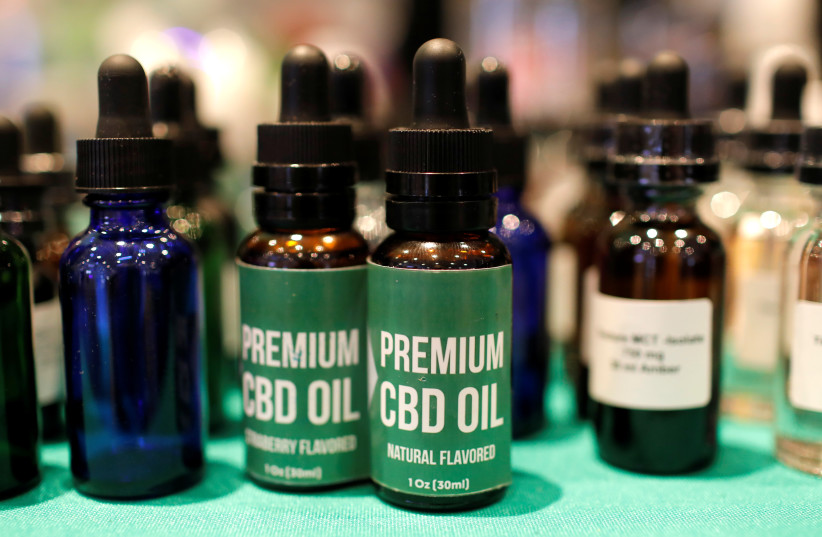 CBD Oil is displayed at The Cannabis World Congress & Business Exposition (CWCBExpo) trade show in New York City, New York, US, May 30, 2019 (photo credit: REUTERS/MIKE SEGAR)