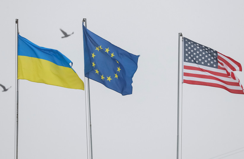  State flags of Ukraine, European Union and US flutter in central Kyiv, Ukraine December 6, 2021 (photo credit: REUTERS/GLEB GARANICH)