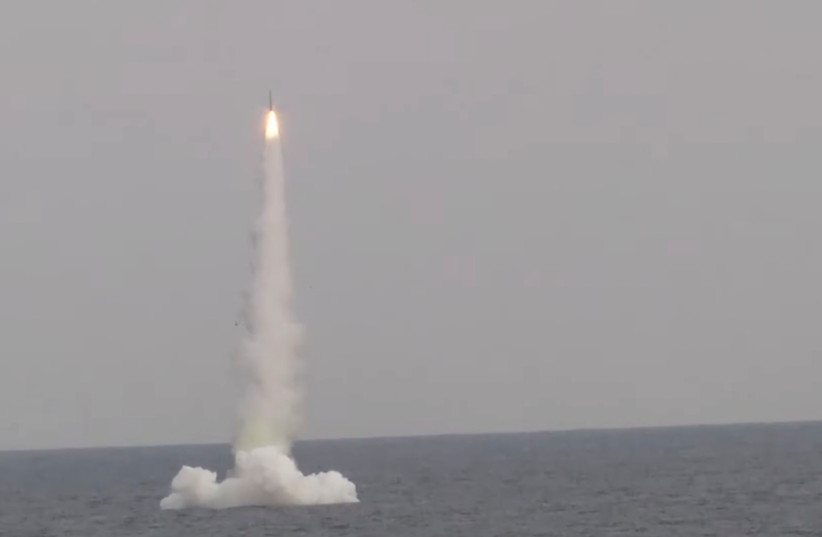  A Kalibr cruise missile is launched from Russian submarine Petropavlovsk-Kamchatsky of the Pacific Fleet during a test in the waters of the Sea of Japan, December 21, 2021. (credit: RUSSIAN DEFENSE MINISTRY/HANDOUT VIA REUTERS)