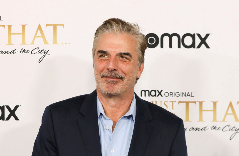 Chris Noth poses during the red carpet premiere of the 'Sex and The City' sequel, 'And Just Like That' in New York City, US, December 8, 2021. (photo credit: REUTERS/CAITLIN OCHS/FILE PHOTO)