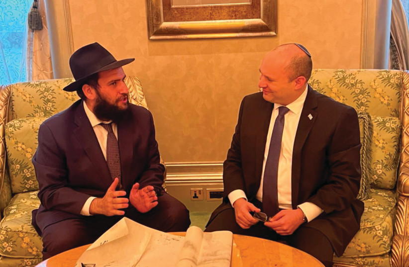 Prime Minister Naftali Bennett with UAE Rabbi Levi Duchman (credit: JEWISH UAE)