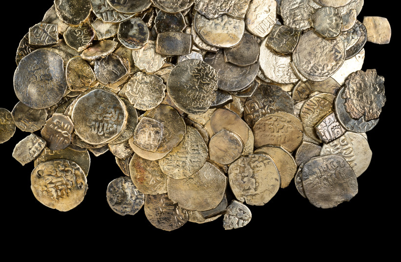  Hoard of coins from the Mamluk period including cut coins. (credit: DAFNA GAZIT/ISRAEL ANTIQUITIES AUTHORITY)
