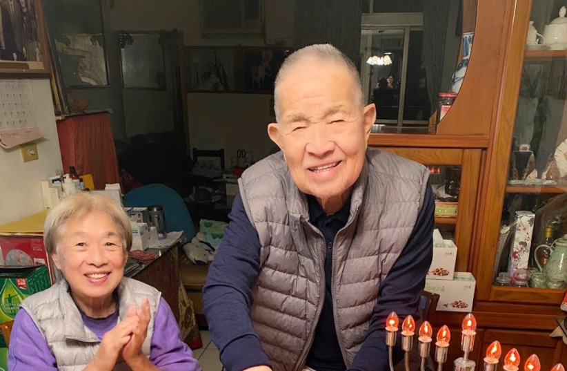  WANG’S PARENTS celebrate her father’s birthday on Hanukkah in Taiwan. (credit: GRACE WANG)