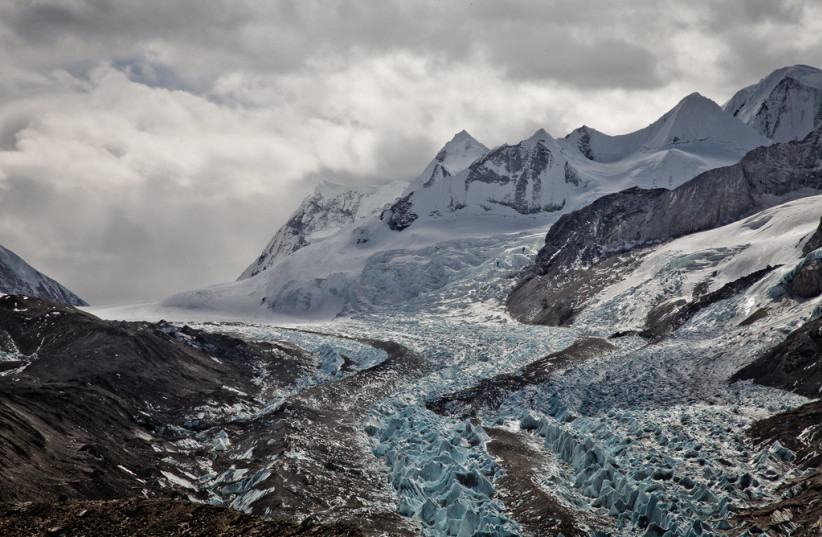  Himalayan glacier and Nangpa La border pass to Nepal in the distance.  (photo credit: Erik Törner/FLICKR)