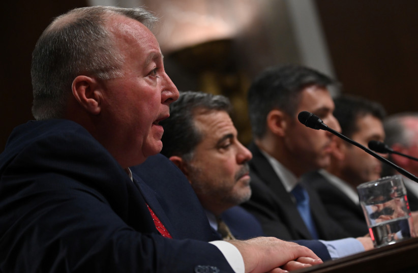  Balfour Beatty Communities President Christopher Williams testifies before Senate Armed Services subcommittees on the Military Housing Privatization Initiative in Washington, U.S. February 13, 2019. (photo credit: ERIN SCOTT/REUTERS)