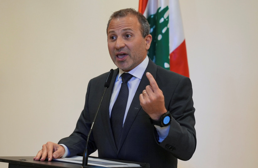 Gebran Bassil, leader of Lebanon's biggest Christian bloc, the Free Patriotic Movement, gestures as he speaks after a parliamentary session at UNESCO Palace in Beirut, Lebanon, October 19, 2021. (photo credit: REUTERS/ISSAM ABDALLAH)
