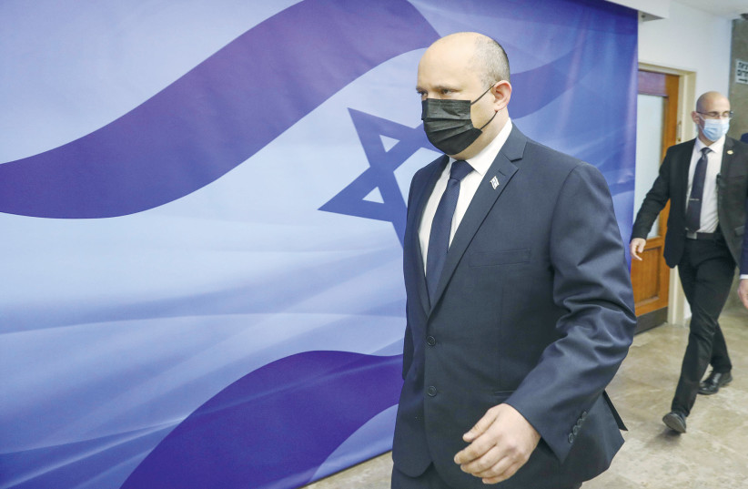 PRIME MINISTER Naftali Bennett on his way to a cabinet meeting.  (photo credit: MARC ISRAEL SELLEM/THE JERUSALEM POST)