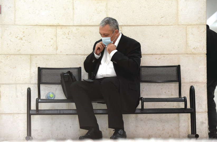  NIR HEFTZ sits outside the courtroom during the trial of former prime minister Benjamin Netanyahu. (photo credit: Reuven Castro/Walla)