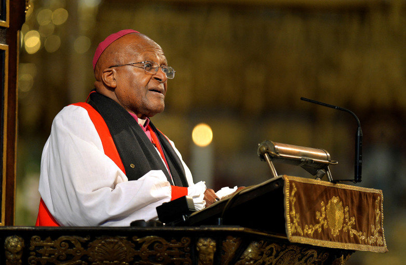  Archbishop Desmond Tutu speaks during a memorial service for former South African President Nelson Mandela at Westminster Abbey in London March 3, 2014. (credit: REUTERS/JOHN STILLWELL/POOL)