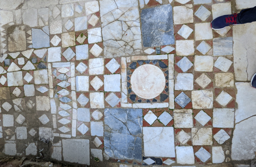  The floor of the synagogue in Side, Turkey, features a plaque with Greek and Hebrew inscriptions.  (photo credit: TWITTER)