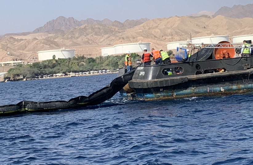 The Environmental Protection Ministry holds a drill in December 2021 to practice cleaning the Eilat Port from an oil spill. (credit: ENVIRONMENT PROTECTION MINISTRY)