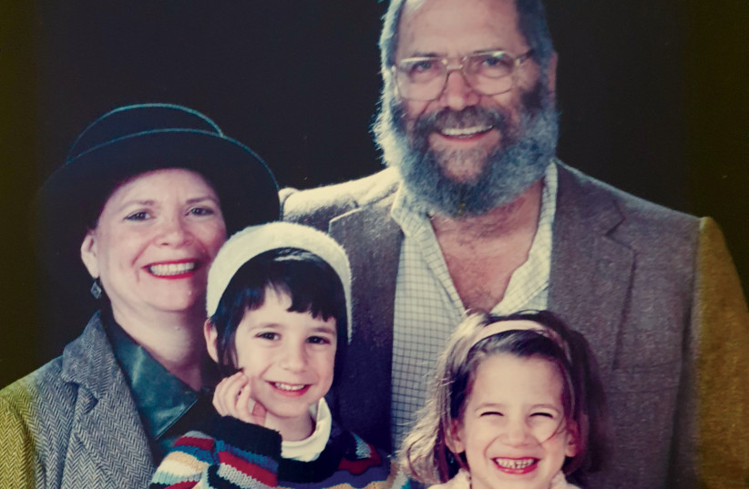  Jack and Meira Golbert with twins Zohar and Sophia at 3, now 21. Jack has since passed away. (credit: MEIR ZAROVSKY)