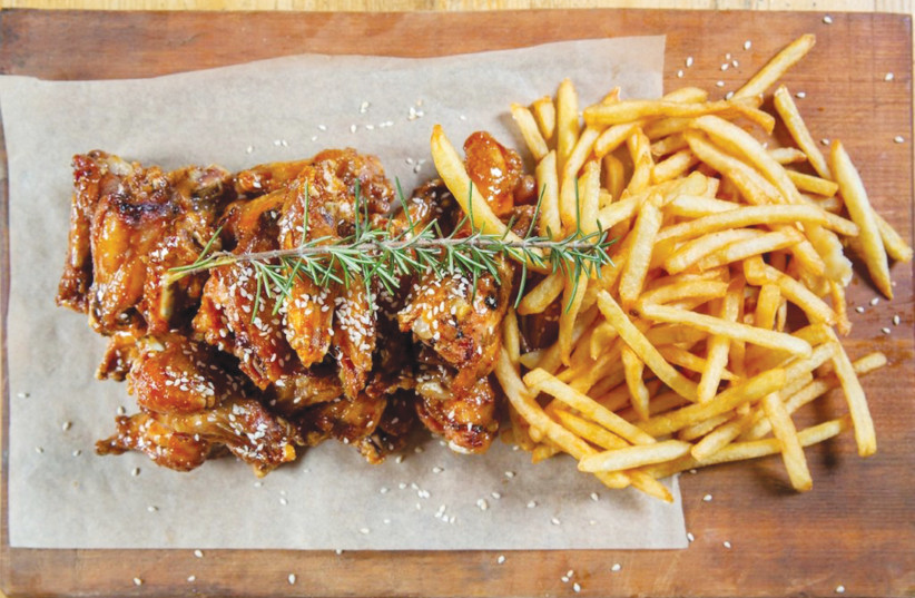  Delicious chicken wings and fries from Portuguese (photo credit: Courtesy)