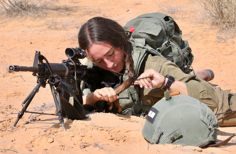  A female soldier in the field. (credit: MARC ISRAEL SELLEM)