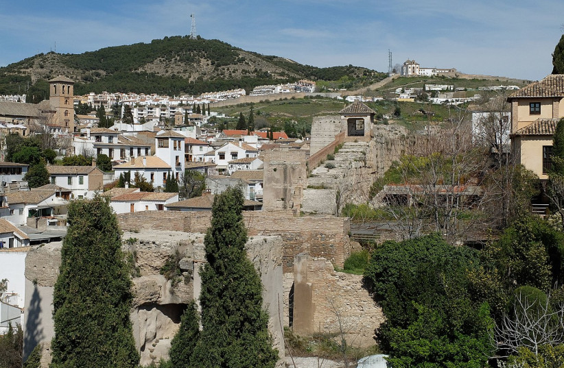 Views of the Zirid walls of Granada from the lookout tower of the Dar al-Horra palace. (credit: Wikimedia Commons)