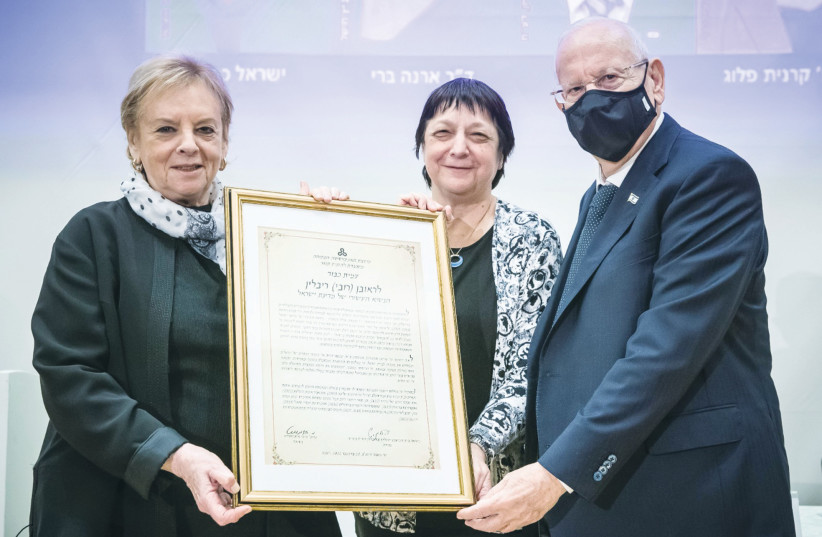  Reuven Rivlin receives an honorary fellowship from the Open University of Israel, conferred on him by former Supreme Court president Dorit Beinisch (left), who heads the university’s board of governors and university president Prof. Mimi Ajzenstadt. (photo credit: ODED KARNI)