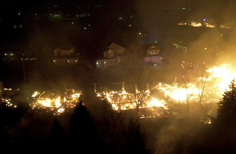  A general view of burnt down houses in a neighbourhood in Superior, Boulder County, Colorado, U.S. December 30, 2021 in this still image obtained January 1, 2022 from a video shot with a drone. (photo credit: KAARL HOOPES FALCON AERIAL IMAGING/VIA REUTERS)