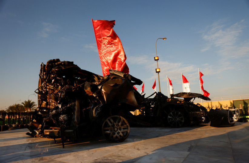  A view shows the remains of destroyed vehicles during the second anniversary of the killing of Iranian military commander General Qassem Soleimani and Iraqi militia leader Abu Mahdi al-Muhandis in a US drone attack, at Baghdad Airport in Baghdad, Iraq, January 2, 2022. (photo credit: REUTERS/SABA KAREEM)