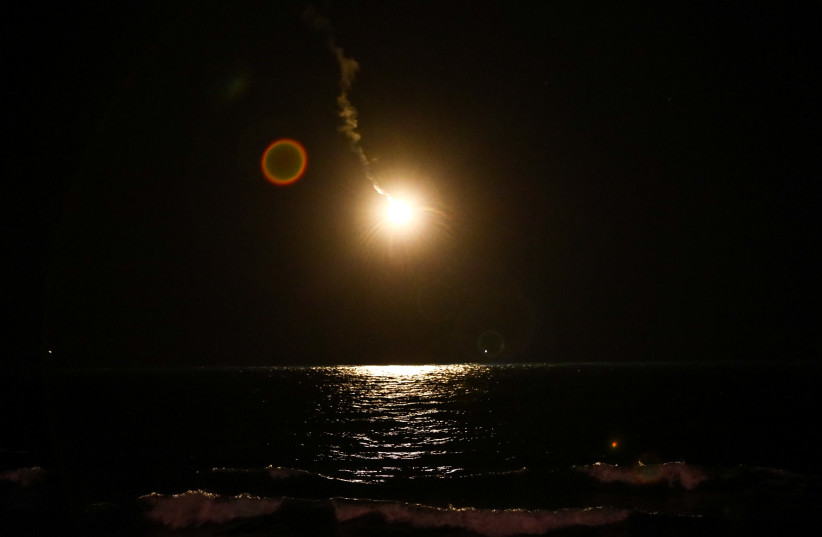  An Israeli army flare illuminating the sky during searches for survivors after a helicopter crashed off the coast of the northern Israeli city of Hafia, January 3, 2021.  (credit: ALON NADAV/FLASH 90)