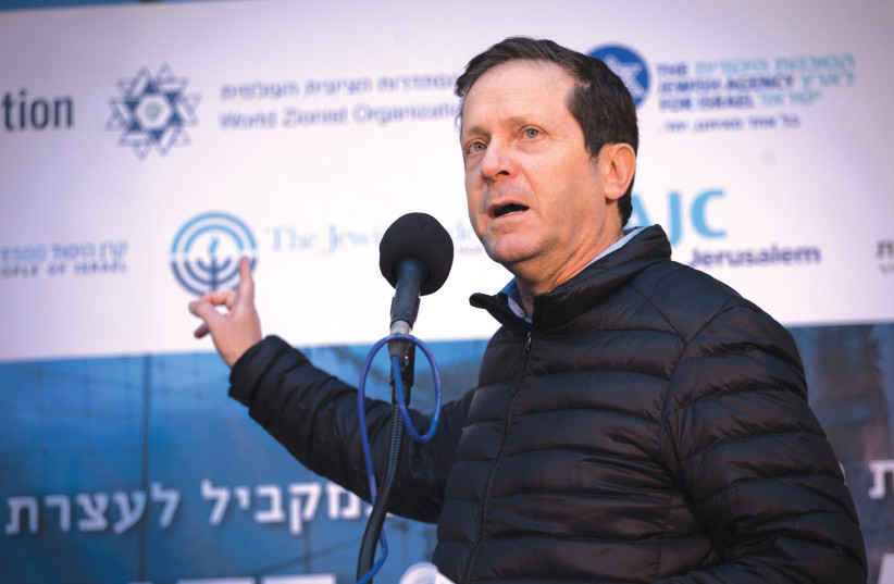  President Isaac Herzog, then serving as Jewish Agency chairman, speaks during a rally in Jerusalem in 2020 held in solidarity with Jews in the US and around the world following a wave of antisemitic attacks. (credit: HADAS PARUSH/FLASH90)